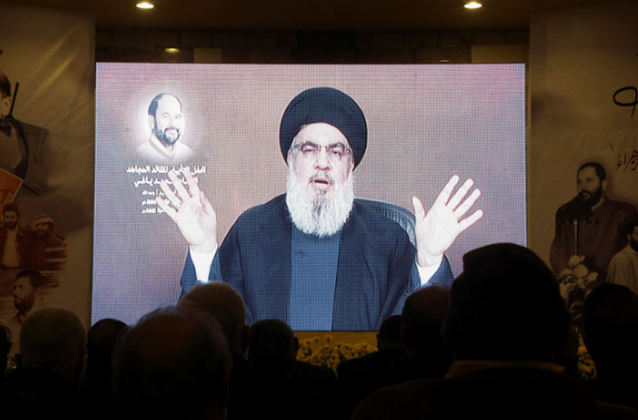 Lebanon's Hezbollah supporters listen to their leader Sayyed Hassan Nasrallah